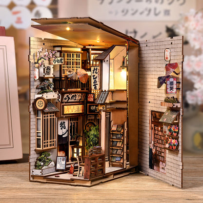 Book Nook japonais à monter soi-même avec détails de boutiques traditionnelles, enseignes lumineuses, bonsaï et petits chats, kit de loisirs créatifs en bois avec système d'éclairage intégré.