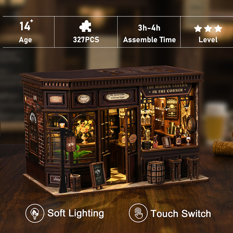 Image promotionnelle d'un kit de miniature en bois assemblé représentant un bar vintage nommé "The Hidden Tavern". L'image affiche les spécifications : plus de 14 ans, 327 pièces, 3 à 4 heures de montage, éclairage doux et interrupteur tactile.