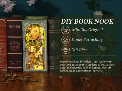 Maquette DIY Book Nook inspirée du Magicien d'Oz, représentant Dorothy et Toto dans une scène miniature illuminée entre deux livres sur une étagère.