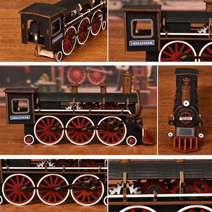 Détails d'une locomotive à vapeur miniature en bois : roues rouges, engrenages apparents et finitions du modèle Challenger pour puzzle 3D.