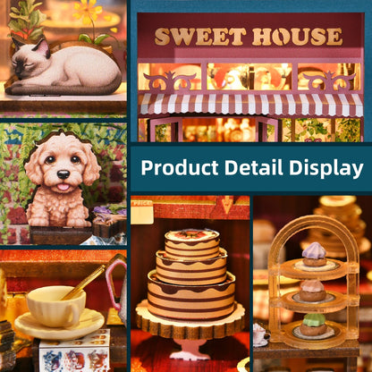 Affichage des détails du kit Book Nook Sweet House : figurines de chat et chien, pâtisseries miniatures, gâteau à étages, tasse de thé dorée et enseigne lumineuse. Zoom sur la qualité d'une maquette DIY en bois