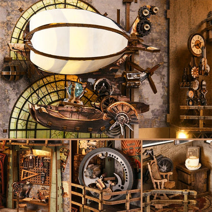 Gros plan sur les détails d'un kit Book Nook steampunk montrant un dirigeable miniature avec engrenages, un établi d'atelier avec des outils (équerre, marteau), une grande roue mécanique industrielle et un coin salon vintage avec une chaise à bascule et une tasse de café. La structure en bois découpée au laser présente des textures réalistes et un éclairage LED intégré.