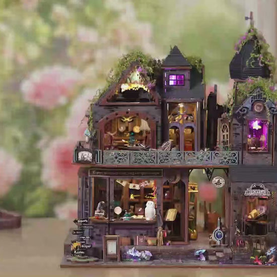 Maquette miniature de maison de sorcière illuminée dans l'obscurité, détails d'apothicaire magique et architecture fantastique avec lumières LED chaudes.